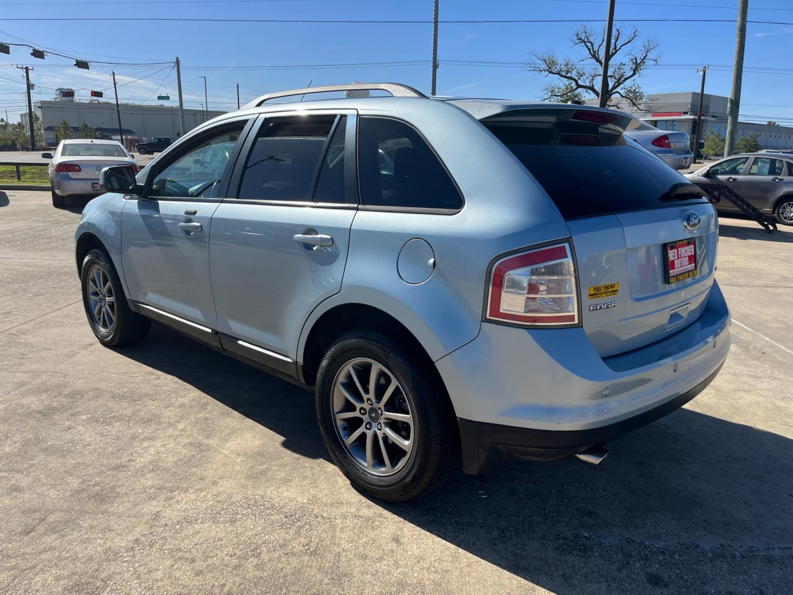 2008 blue /black Ford Edge SEL FWD (2FMDK38C98B) with an 3.5L V6 DOHC 24V engine, 6-Speed Automatic Overdrive transmission, located at 14700 Tomball Parkway 249, Houston, TX, 77086, (281) 444-2200, 29.928619, -95.504074 - Photo #4